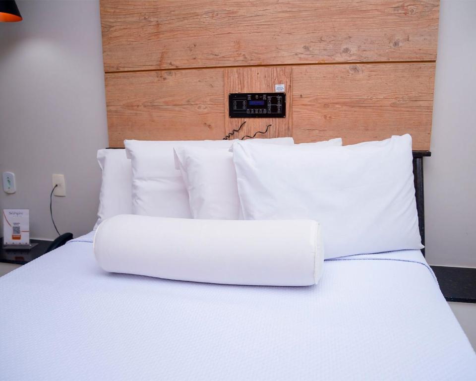 Postel nebo postele na pokoji v ubytování Hotel Sempre Bahia