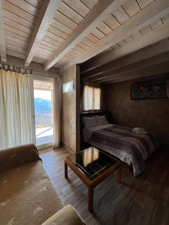 Postel nebo postele na pokoji v ubytování Το Στέκι