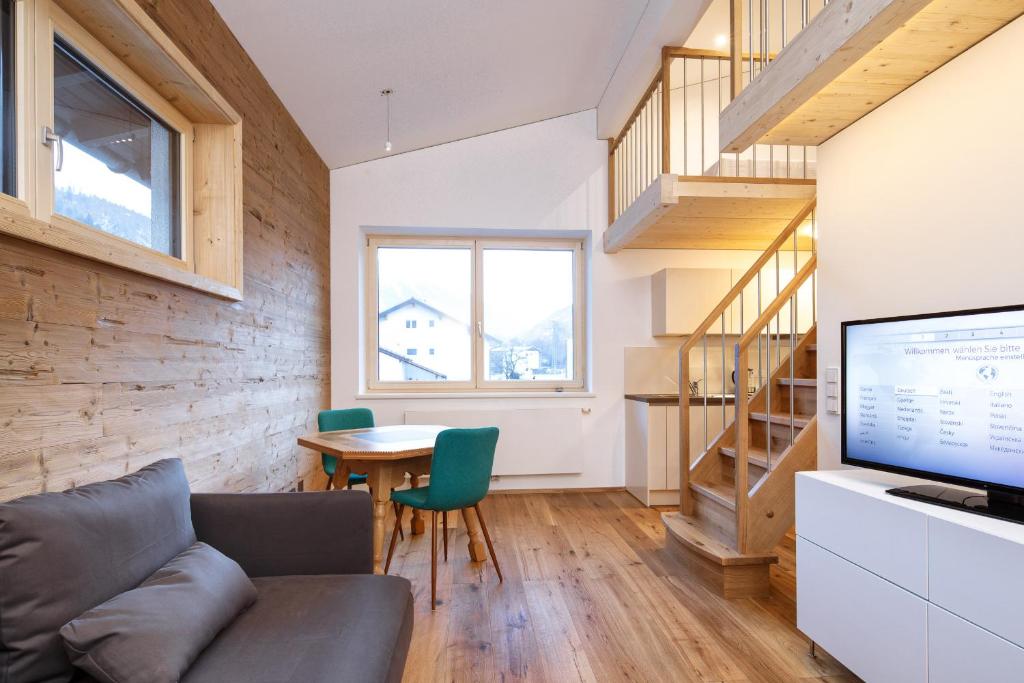 TV a/nebo společenská místnost v ubytování Davenna Loft