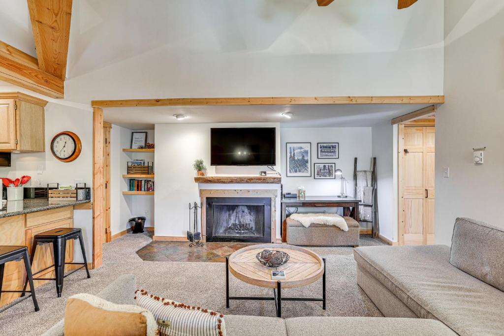 a living room with a couch and a fireplace at Ski Shuttle and Mountain Views Keystone Resort Home in Keystone