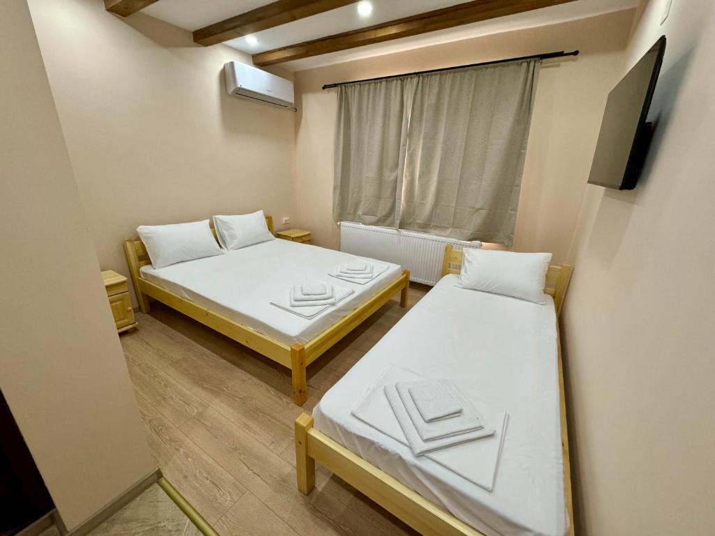 Postel nebo postele na pokoji v ubytování Петропавловската Къща