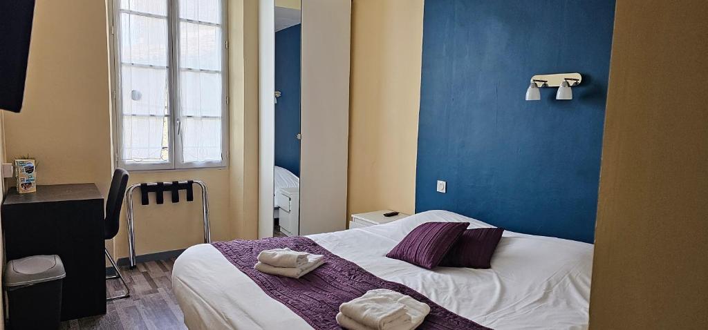 Postel nebo postele na pokoji v ubytování Hotel Belvue