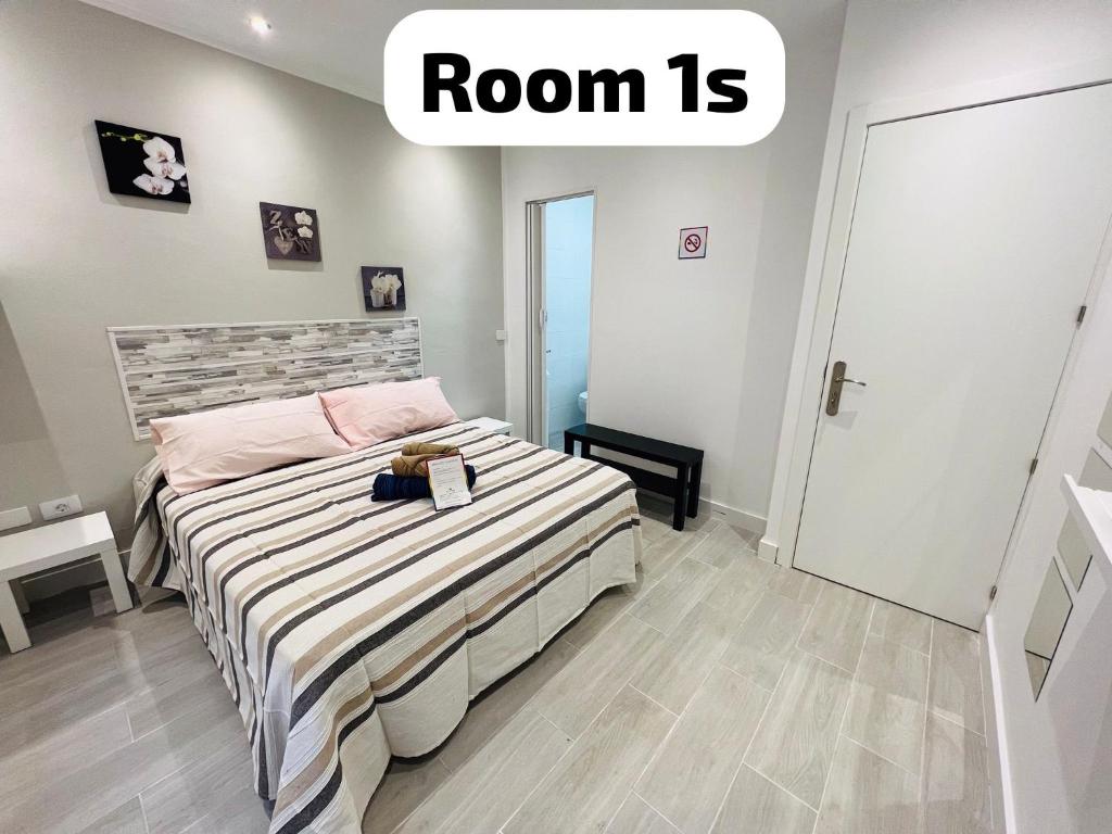 Postel nebo postele na pokoji v ubytování B&B paraiso tenerife super suite