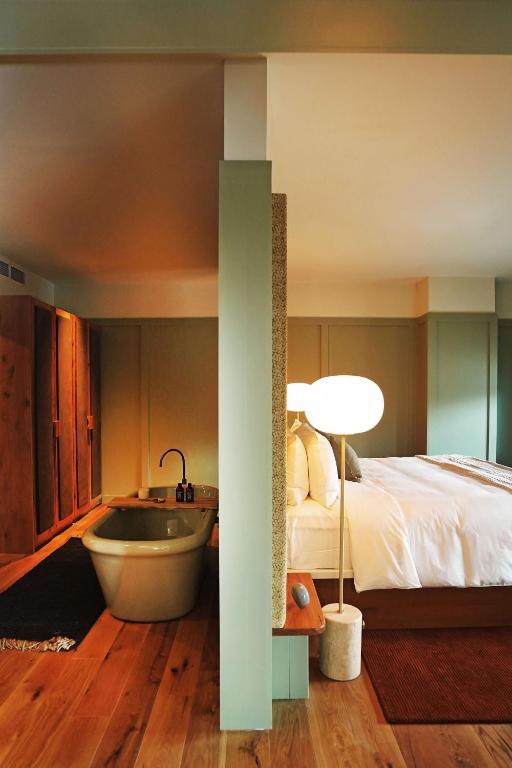 Postel nebo postele na pokoji v ubytování Albert Hotel