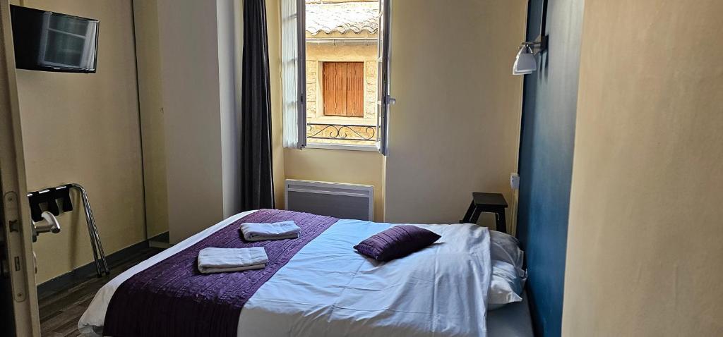 Postel nebo postele na pokoji v ubytování Hotel Belvue