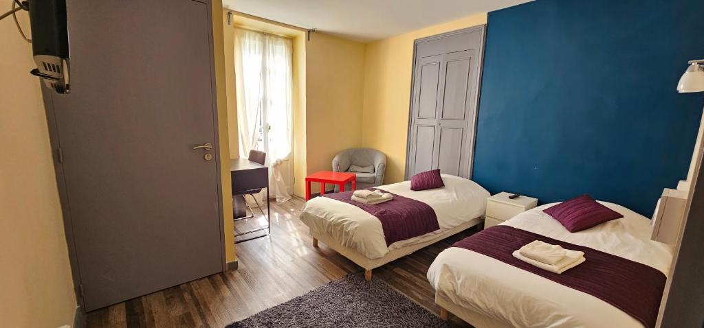 Postel nebo postele na pokoji v ubytování Hotel Belvue