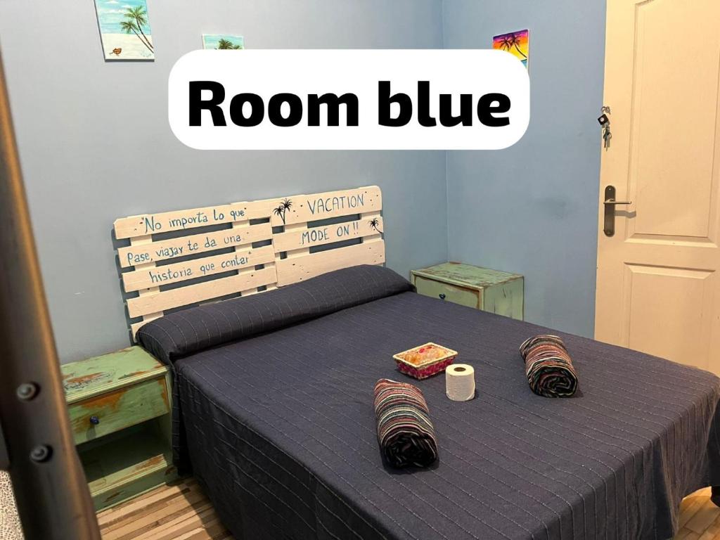 Postel nebo postele na pokoji v ubytování Hostal Paraíso Tenerife