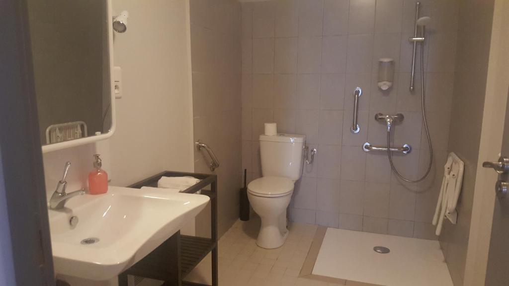 Koupelna v ubytování Hotel Belvue