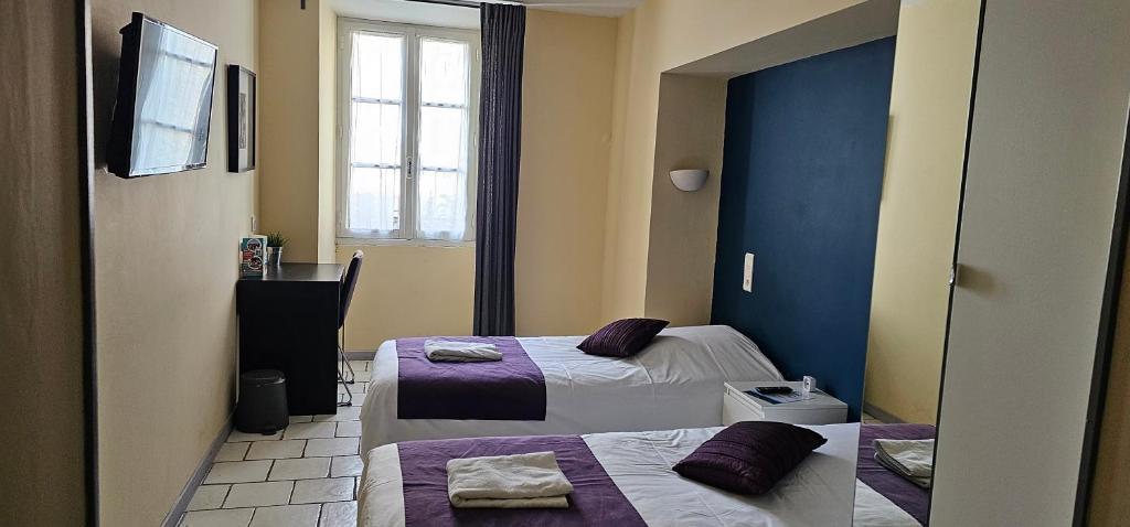 Postel nebo postele na pokoji v ubytování Hotel Belvue