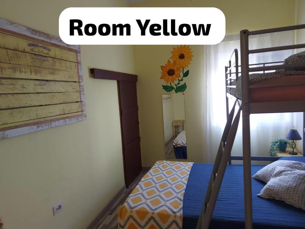 Postel nebo postele na pokoji v ubytování Hostal Paraíso Tenerife