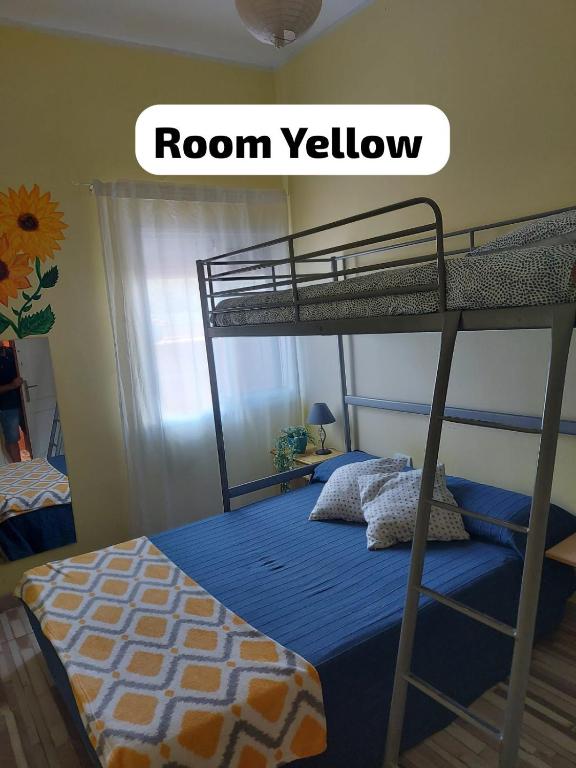 Postel nebo postele na pokoji v ubytování Hostal Paraíso Tenerife