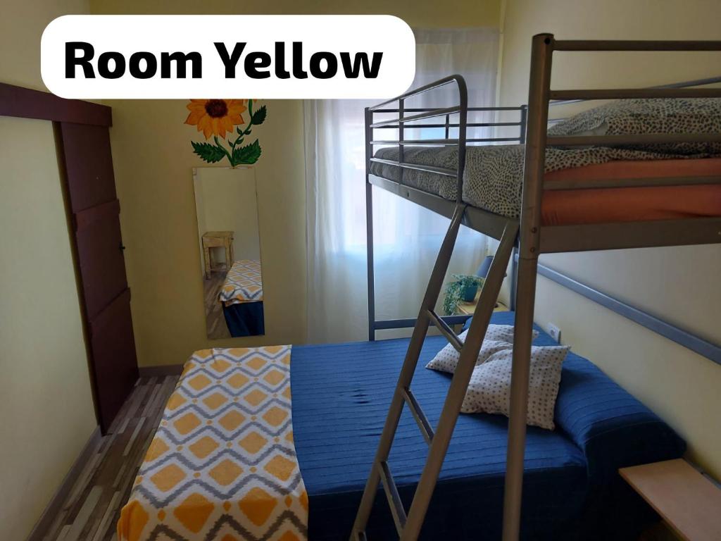 Postel nebo postele na pokoji v ubytování Hostal Paraíso Tenerife