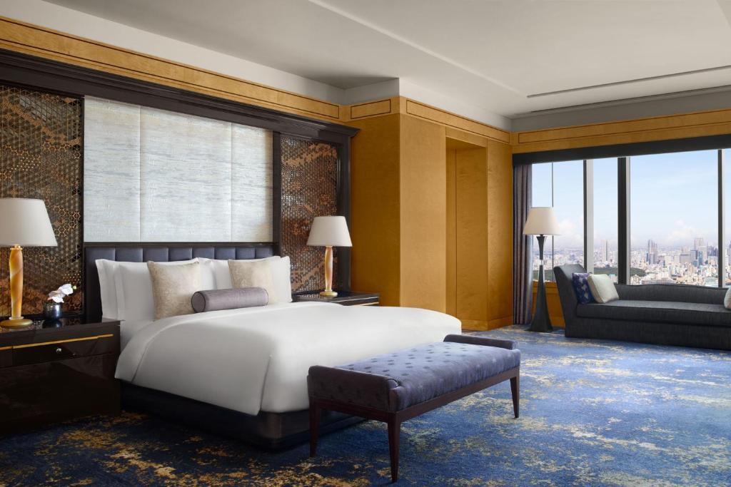 Postel nebo postele na pokoji v ubytování The Ritz-Carlton, Tokyo