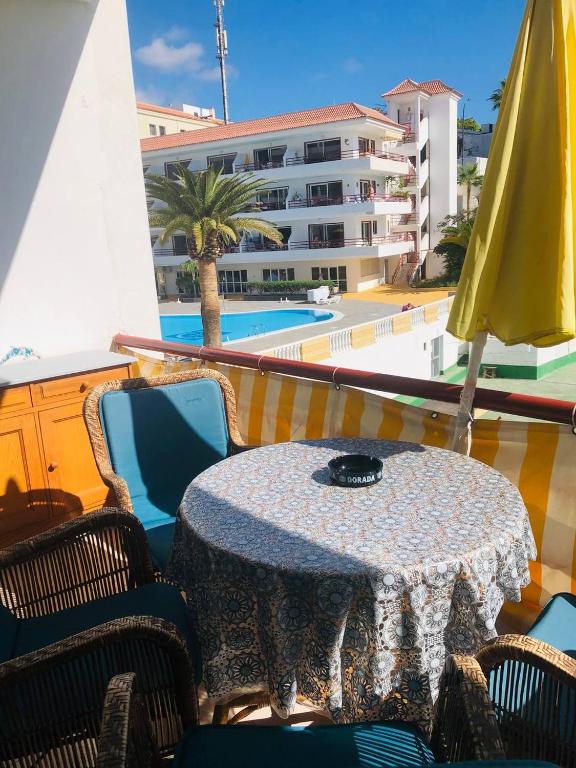 A balcony or terrace at First Line Beach Apartment with Ocean View La Arena
