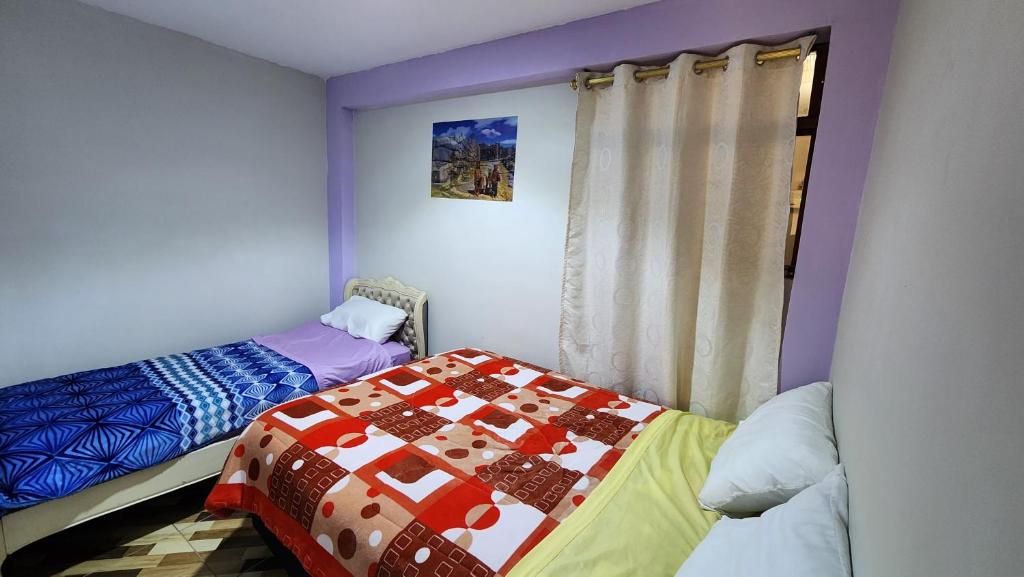 Postel nebo postele na pokoji v ubytování TRANSFER VIP HOSTEL