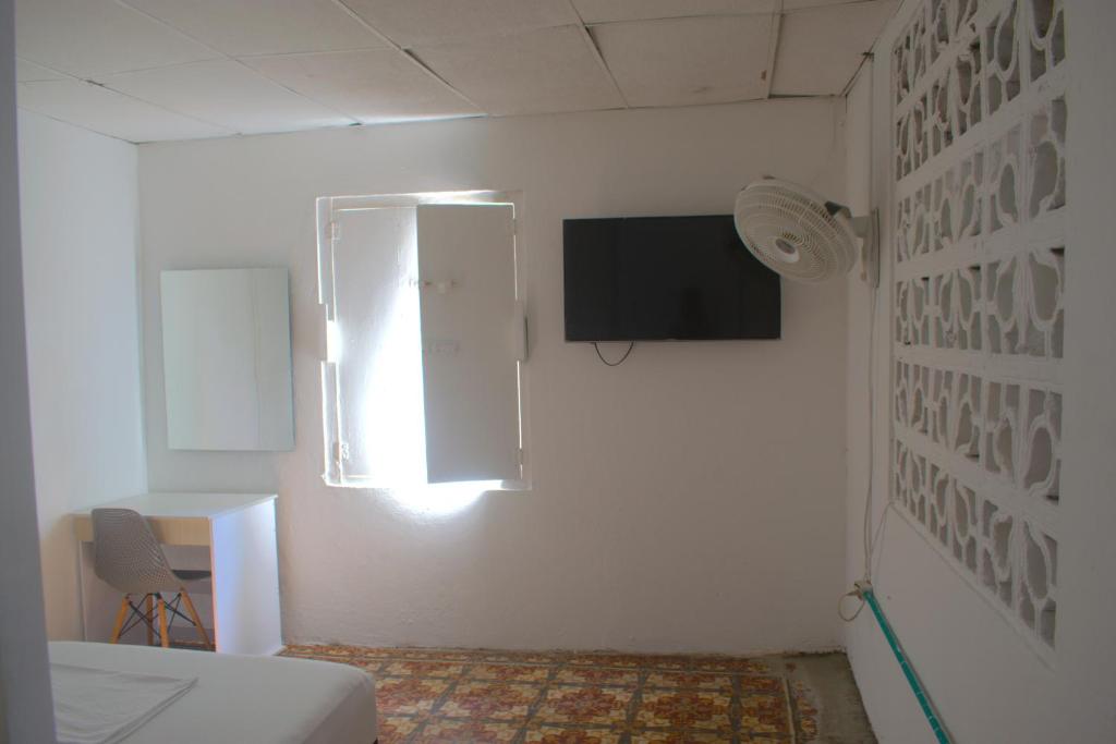TV a/nebo společenská místnost v ubytování Hosting and Travel Services 420