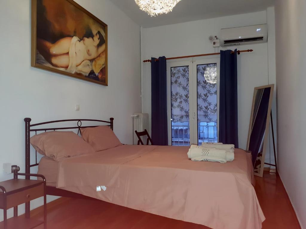 Łóżko lub łóżka w pokoju w obiekcie Success's Apartment