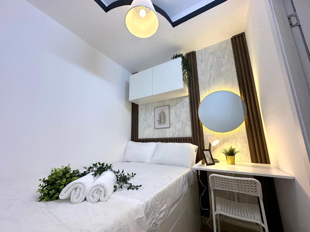 Postel nebo postele na pokoji v ubytování Urban Oasis Partition Room In Barsha 1 Near Metro