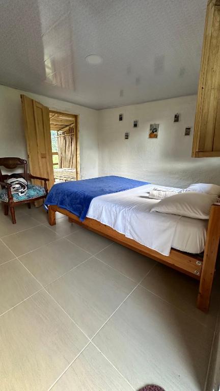 Postel nebo postele na pokoji v ubytování Finca Ecoparaiso