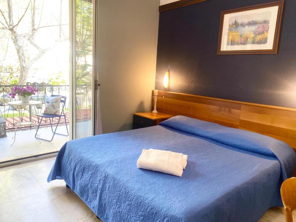 Postel nebo postele na pokoji v ubytování Hotel Praja Mare