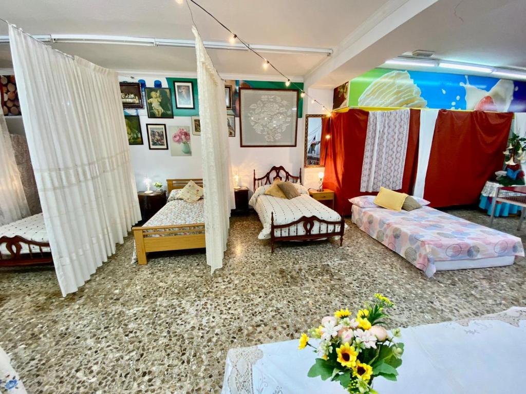 Ένα ή περισσότερα κρεβάτια σε δωμάτιο στο Hostel Venta