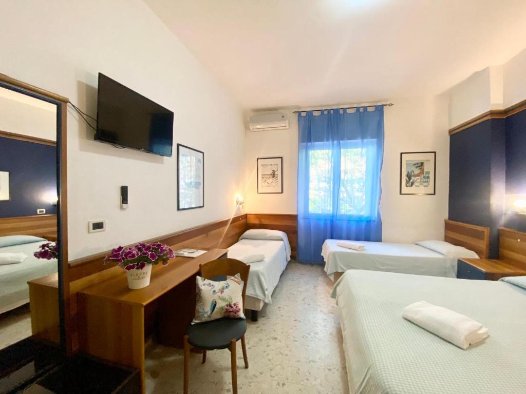 Postel nebo postele na pokoji v ubytování Hotel Praja Mare