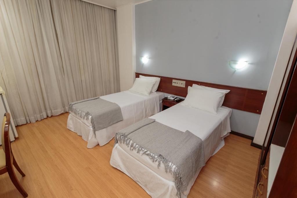 Postel nebo postele na pokoji v ubytování City Hotel by Fast10