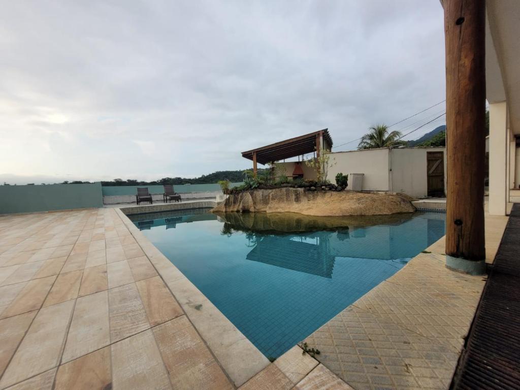 Πισίνα στο ή κοντά στο Casa Rústica Ilhabela