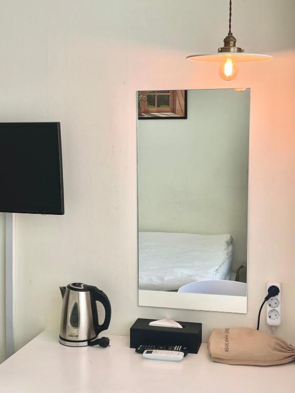 Postel nebo postele na pokoji v ubytování SSH Ikseon peter cat Hostel
