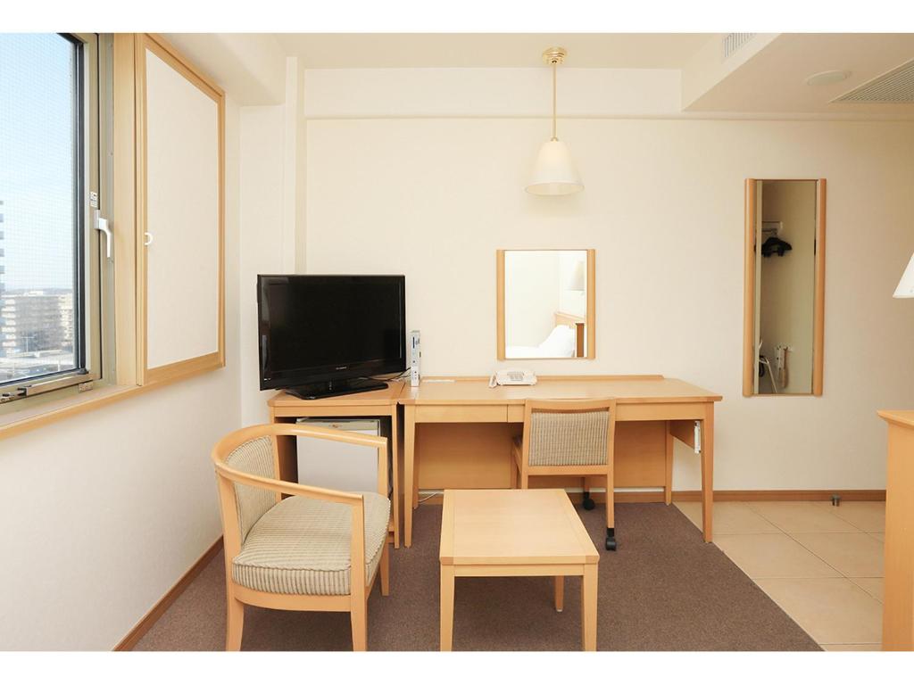 TV a/nebo společenská místnost v ubytování Smile Hotel Nara