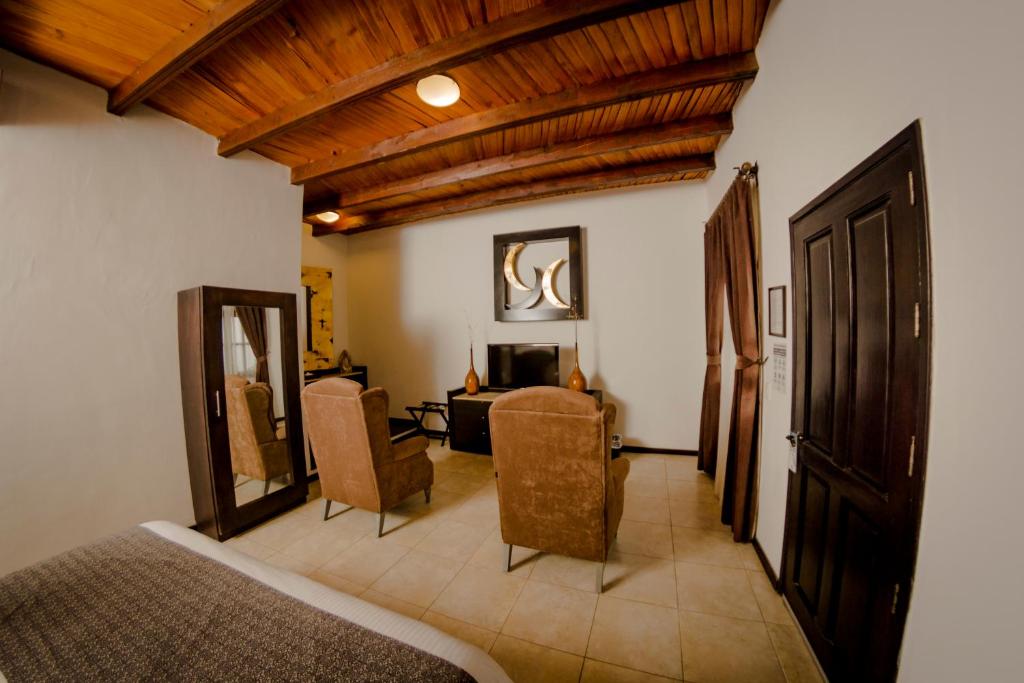 Posezení v ubytování Hotel Boutique Hacienda Guadalupe