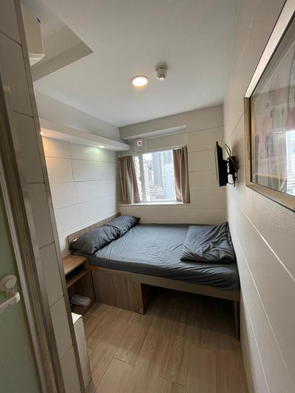 Letto o letti in una camera di 香港榆臨賓館 Yulam Guesthouse