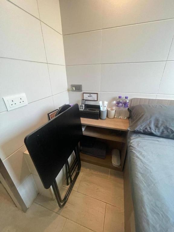 Letto o letti in una camera di 香港榆臨賓館 Yulam Guesthouse