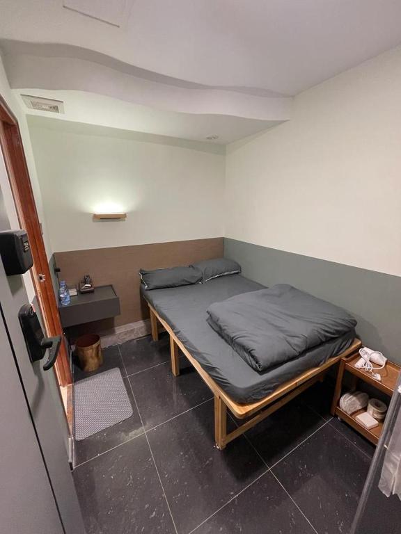 Letto o letti in una camera di 香港榆臨賓館 Yulam Guesthouse
