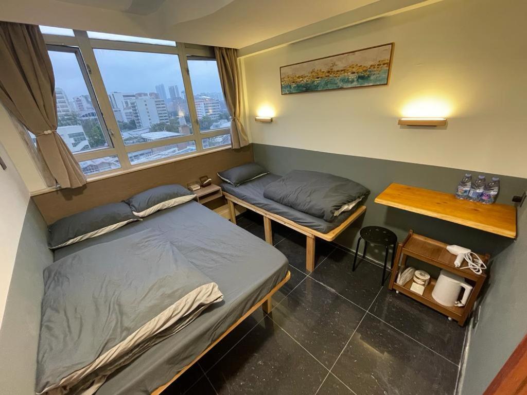 Letto o letti in una camera di 香港榆臨賓館 Yulam Guesthouse