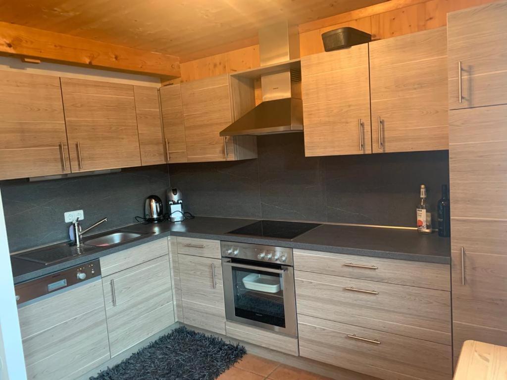 Kuchyň nebo kuchyňský kout v ubytování Feriendorf Tauerngast