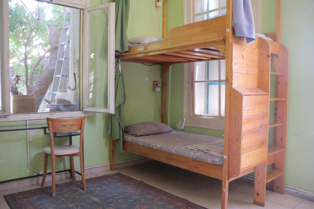 Postel nebo postele na pokoji v ubytování Lotus Garden Hostel Izmir