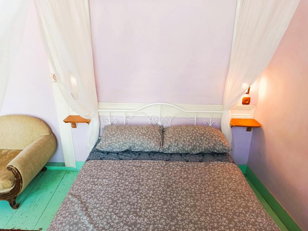 Postel nebo postele na pokoji v ubytování Lotus Garden Hostel Izmir