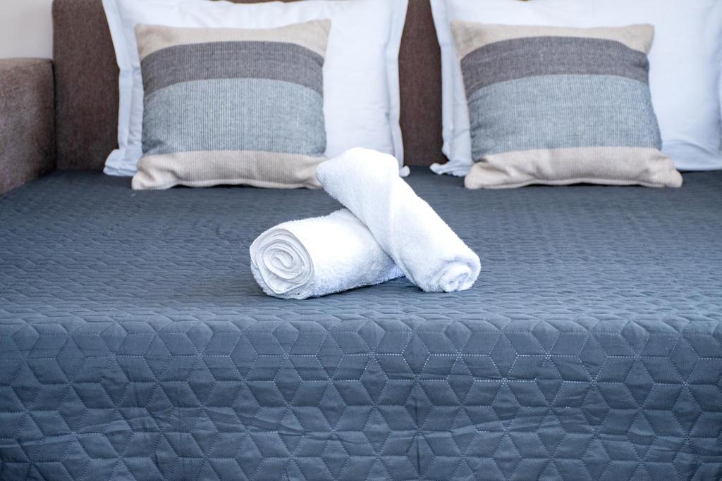 Postel nebo postele na pokoji v ubytování Hotel Orphey