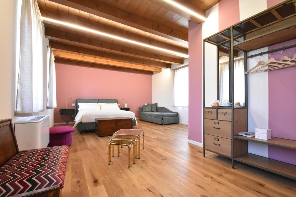 Postel nebo postele na pokoji v ubytování Residenza Vesentini