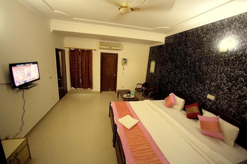 TV a/nebo společenská místnost v ubytování Hotel Smart Stay