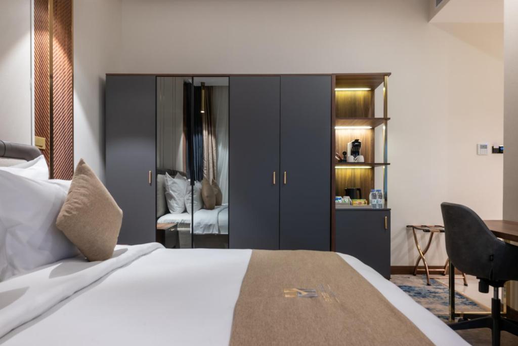 Postel nebo postele na pokoji v ubytování Vender Hotel فندق فندر