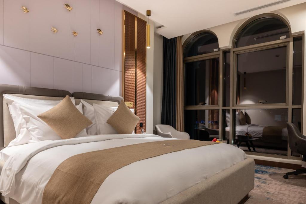 Postel nebo postele na pokoji v ubytování Vender Hotel فندق فندر