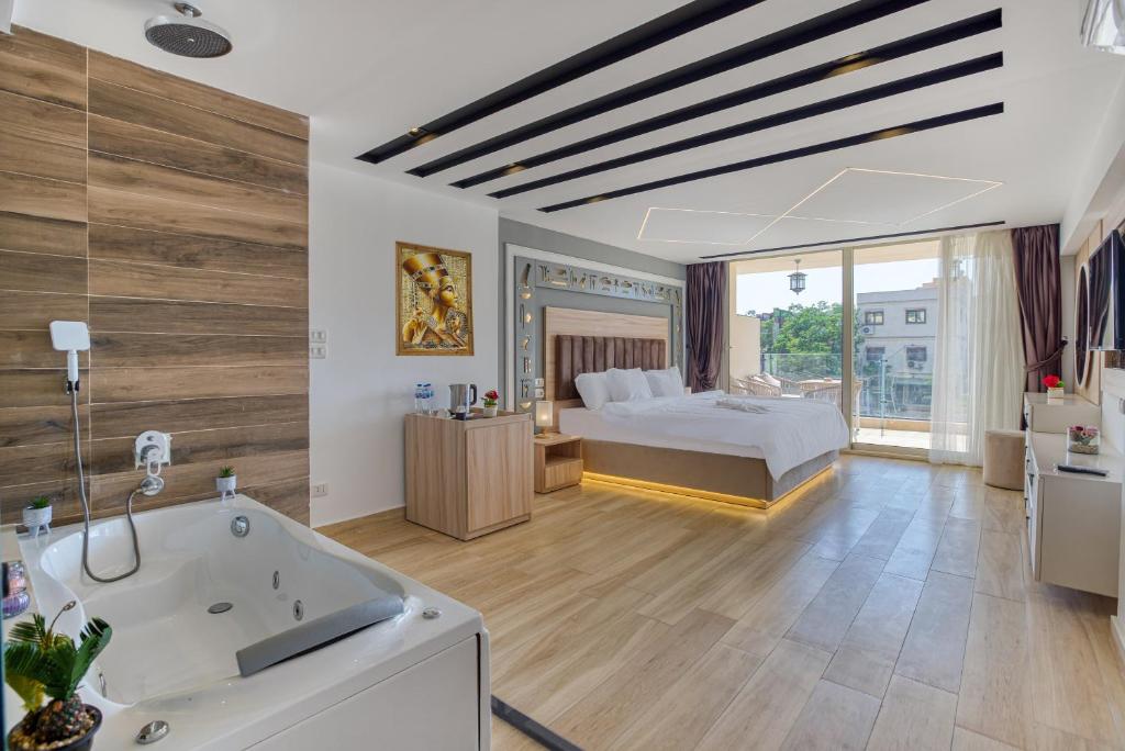 Letto o letti in una camera di The Platinum Pyramid view inn