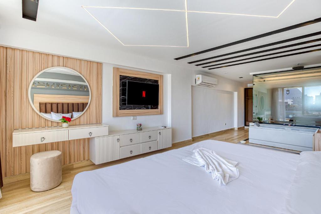 Letto o letti in una camera di The Platinum Pyramid view inn