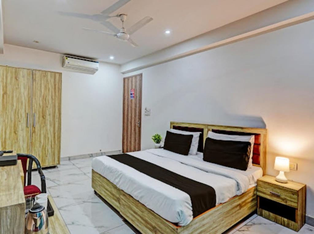 Postel nebo postele na pokoji v ubytování Akshay dream stay