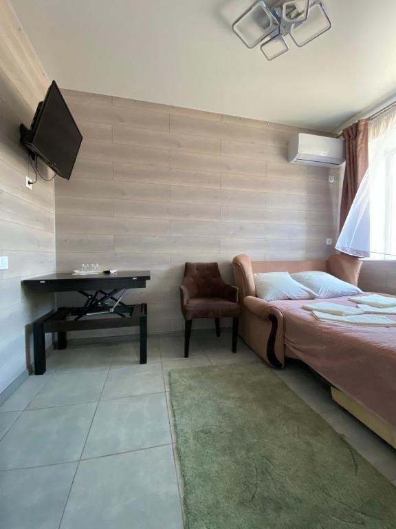 Postel nebo postele na pokoji v ubytování Hotel TETRIS Voznesensk