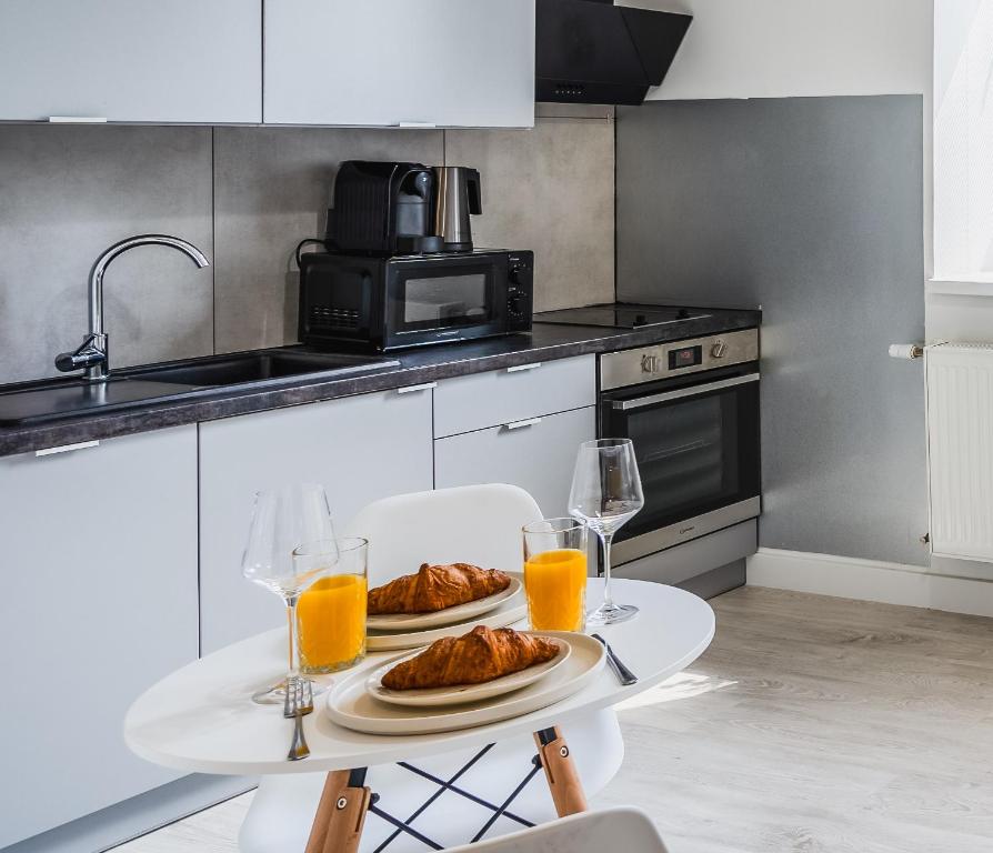 Kuchyň nebo kuchyňský kout v ubytování Apartment Quiet Street 11/5E