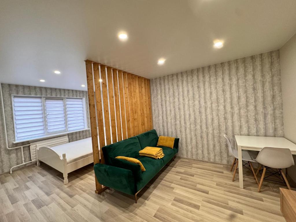 Posezení v ubytování Tall61 Apartment
