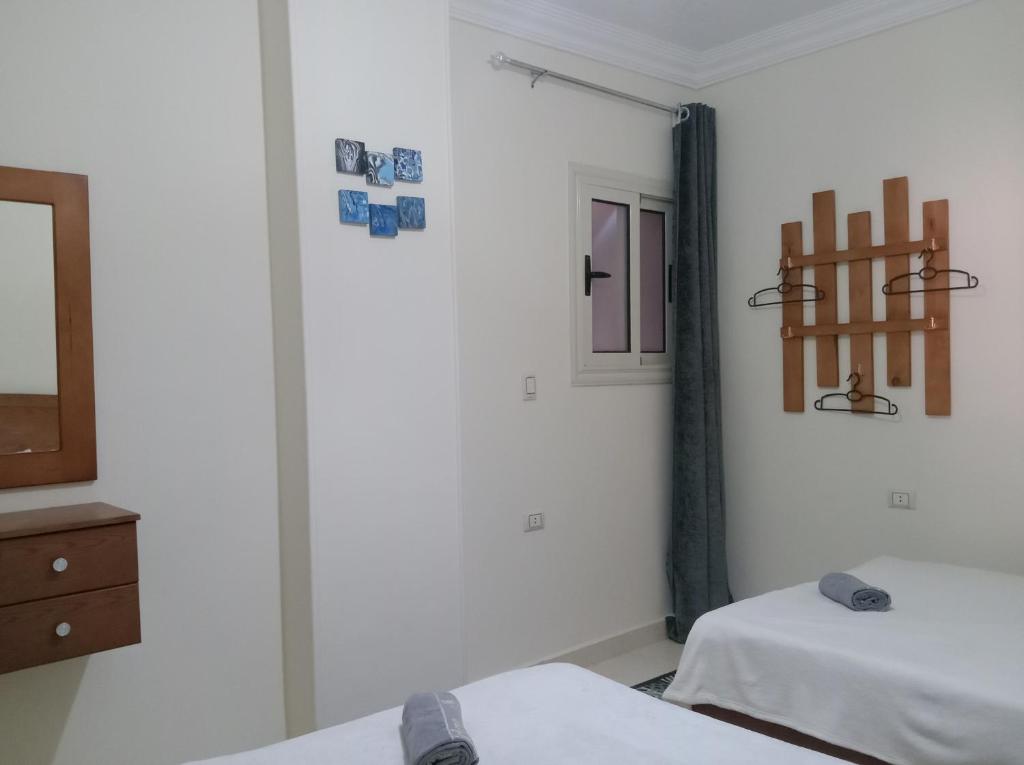 Postel nebo postele na pokoji v ubytování Giza Home Pyramids